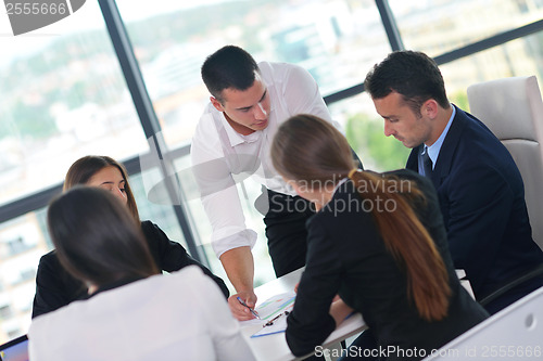 Image of business people group in a meeting at office