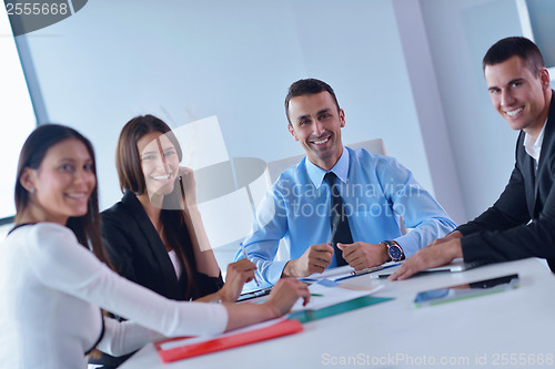 Image of business people group in a meeting at office