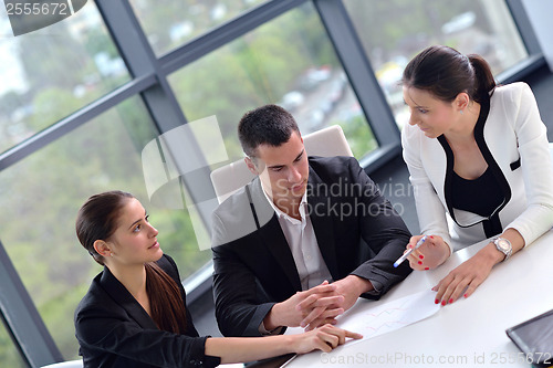 Image of business people group in a meeting at office