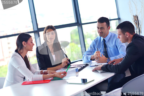 Image of business people group in a meeting at office