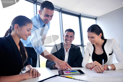 Image of business people group in a meeting at office