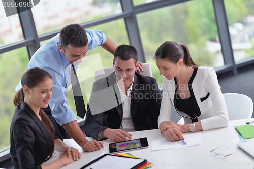 Image of business people group in a meeting at office