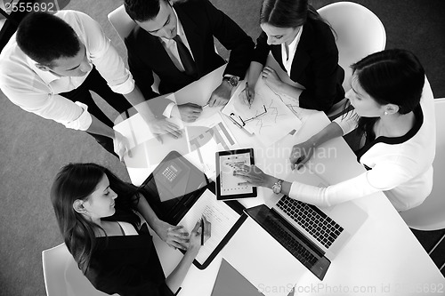 Image of business people group in a meeting at office