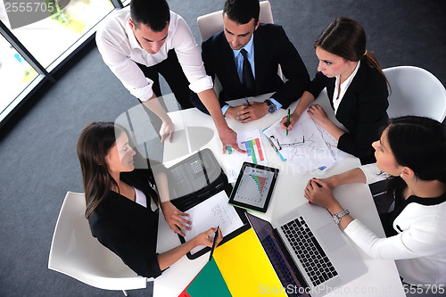 Image of business people group in a meeting at office
