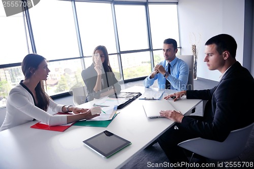 Image of business people group in a meeting at office