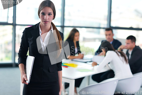 Image of business people group in a meeting at office