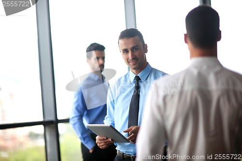 Image of business people group in a meeting at office