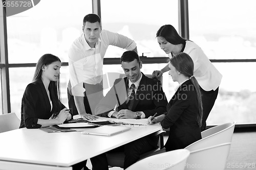 Image of business people group in a meeting at office