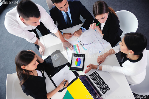 Image of business people group in a meeting at office
