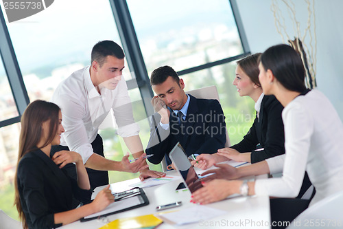 Image of business people group in a meeting at office