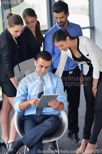 Image of business people group in a meeting at office