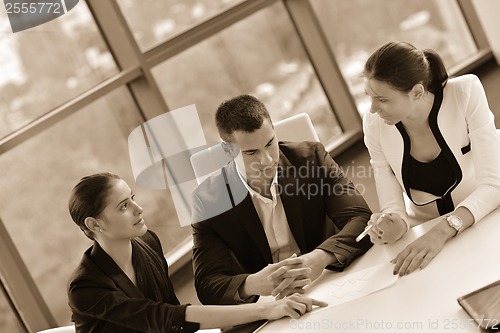 Image of business people group in a meeting at office
