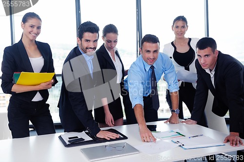 Image of business people group in a meeting at office