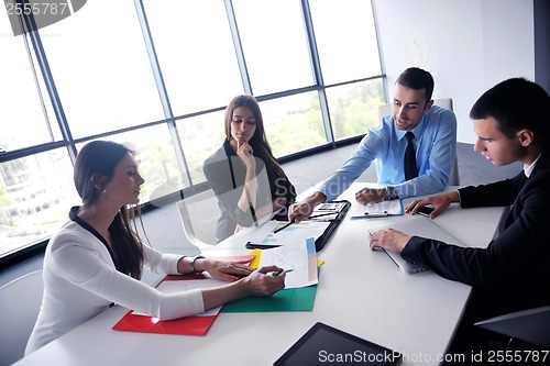 Image of business people group in a meeting at office
