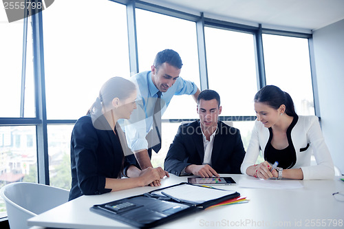 Image of business people group in a meeting at office