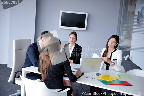 Image of business people group in a meeting at office