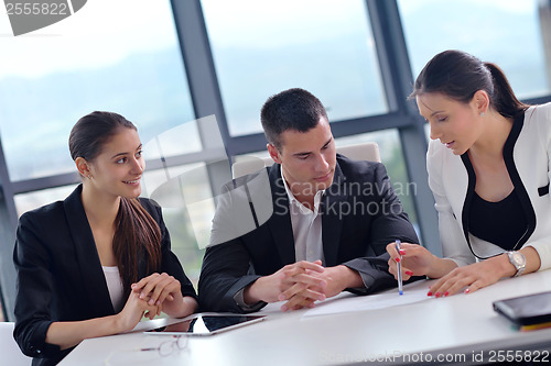 Image of business people group in a meeting at office