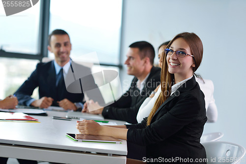 Image of business people group in a meeting at office