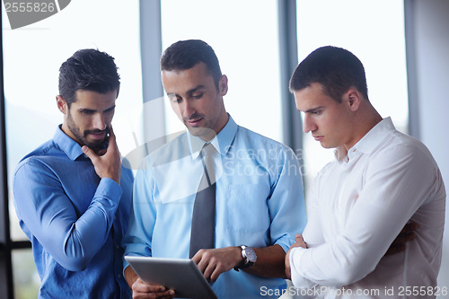 Image of business people group in a meeting at office