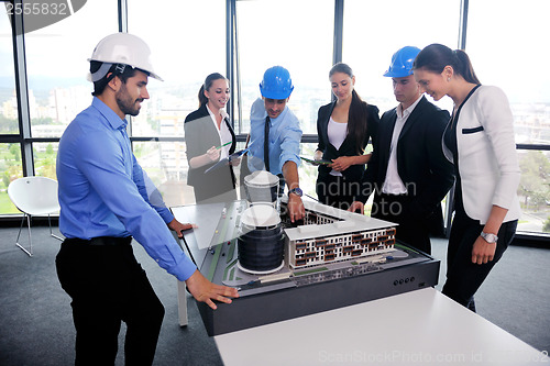 Image of business people group in a meeting at office