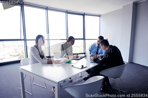 Image of business people group in a meeting at office