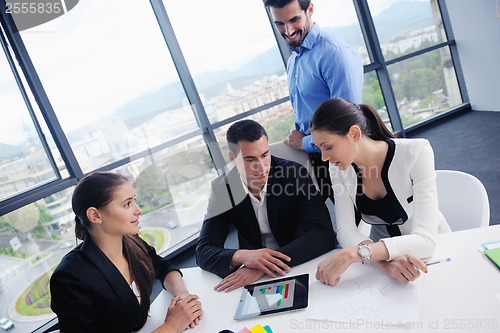Image of business people group in a meeting at office