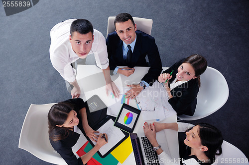 Image of business people group in a meeting at office