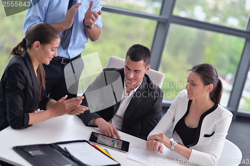 Image of business people group in a meeting at office