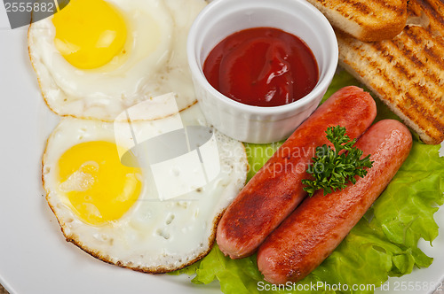 Image of Fried eggs with sausages