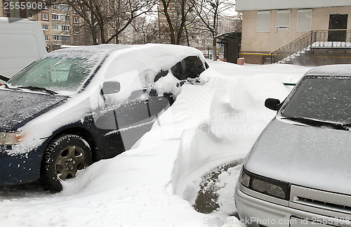 Image of Cars Covered with Snow