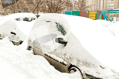 Image of Cars Covered with Snow