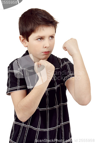 Image of teen boy boxer trains defence