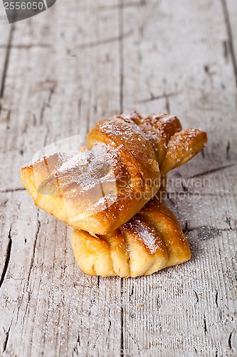 Image of two fresh baked sugar buns 