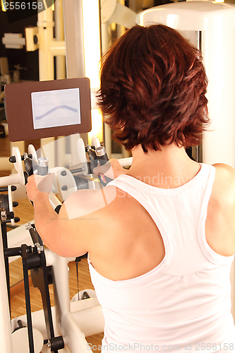 Image of Woman doing workout in gym for  physiotherapy