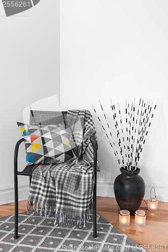 Image of Armchair and decorations in the living room