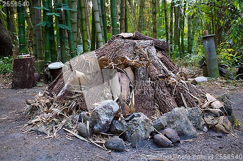 Image of large unlit camp fire