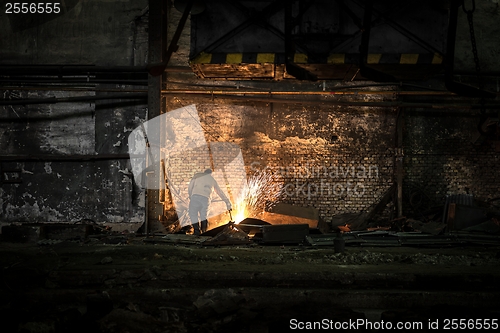 Image of Welding manwith sparks