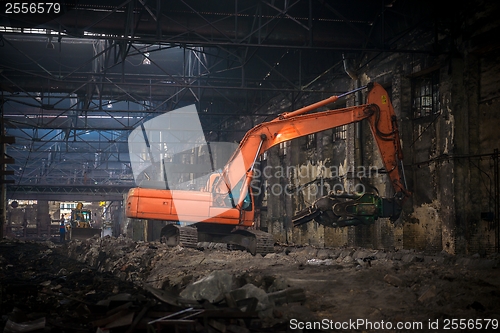 Image of Industrial interior with bulldozer inside