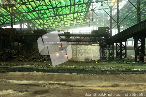 Image of Industrial interior with bulldozer inside