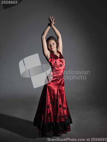 Image of Young woman dancing flamenco