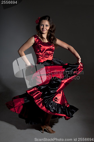 Image of Young woman dancing flamenco