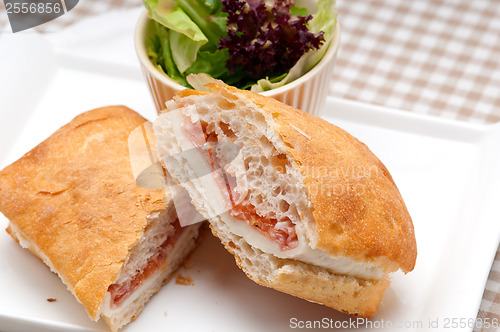 Image of ciabatta panini sandwich with parma ham and tomato