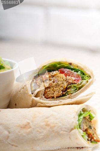 Image of falafel pita bread roll wrap sandwich