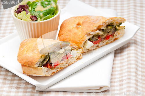 Image of ciabatta panini sandwichwith vegetable and feta