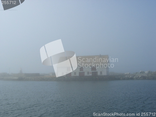 Image of Old seahouse in fog