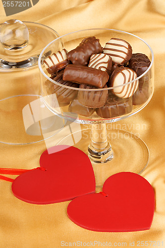 Image of Chocolate pralines and heart shapes