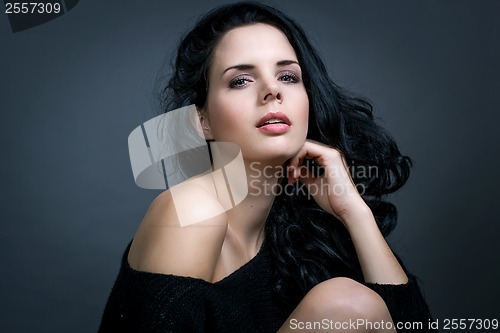 Image of Dark moody portrait of a brunette beauty