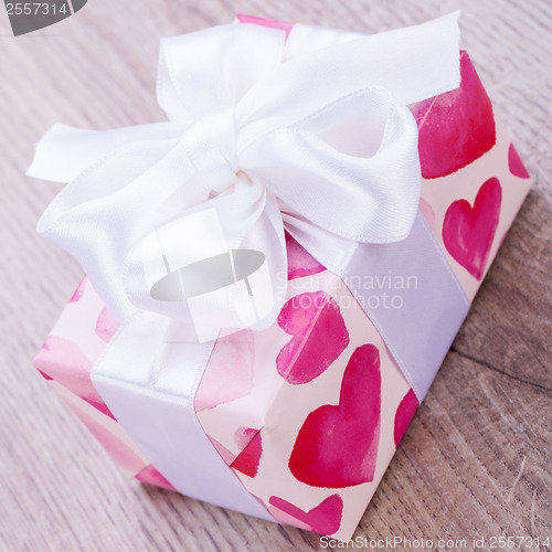 Image of Pretty Valentines gift with hearts on the giftwrap