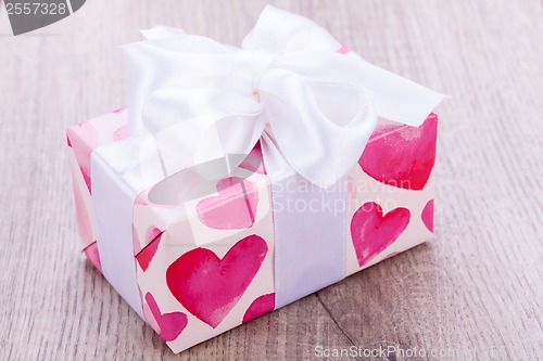 Image of Pretty Valentines gift with hearts on the giftwrap