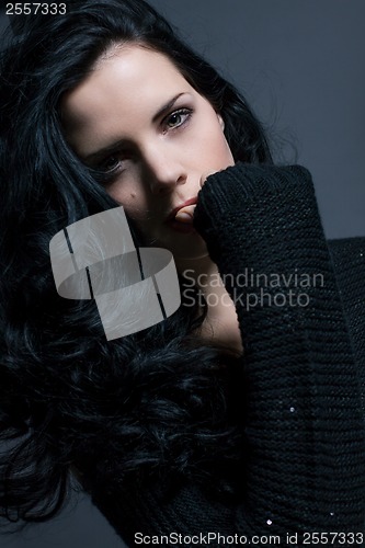 Image of Dark moody portrait of a brunette beauty